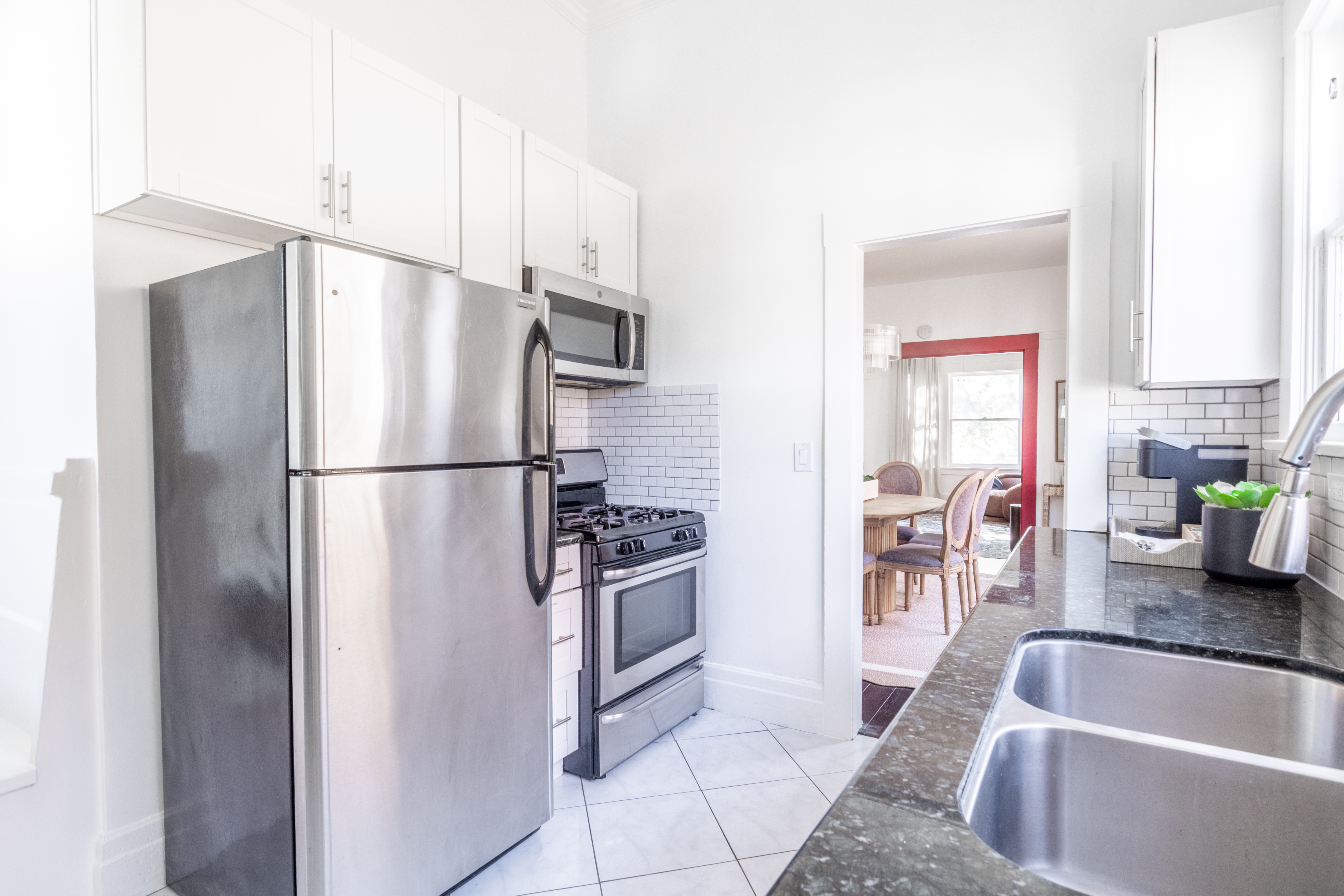 Kitchen showing stove and refrigerator