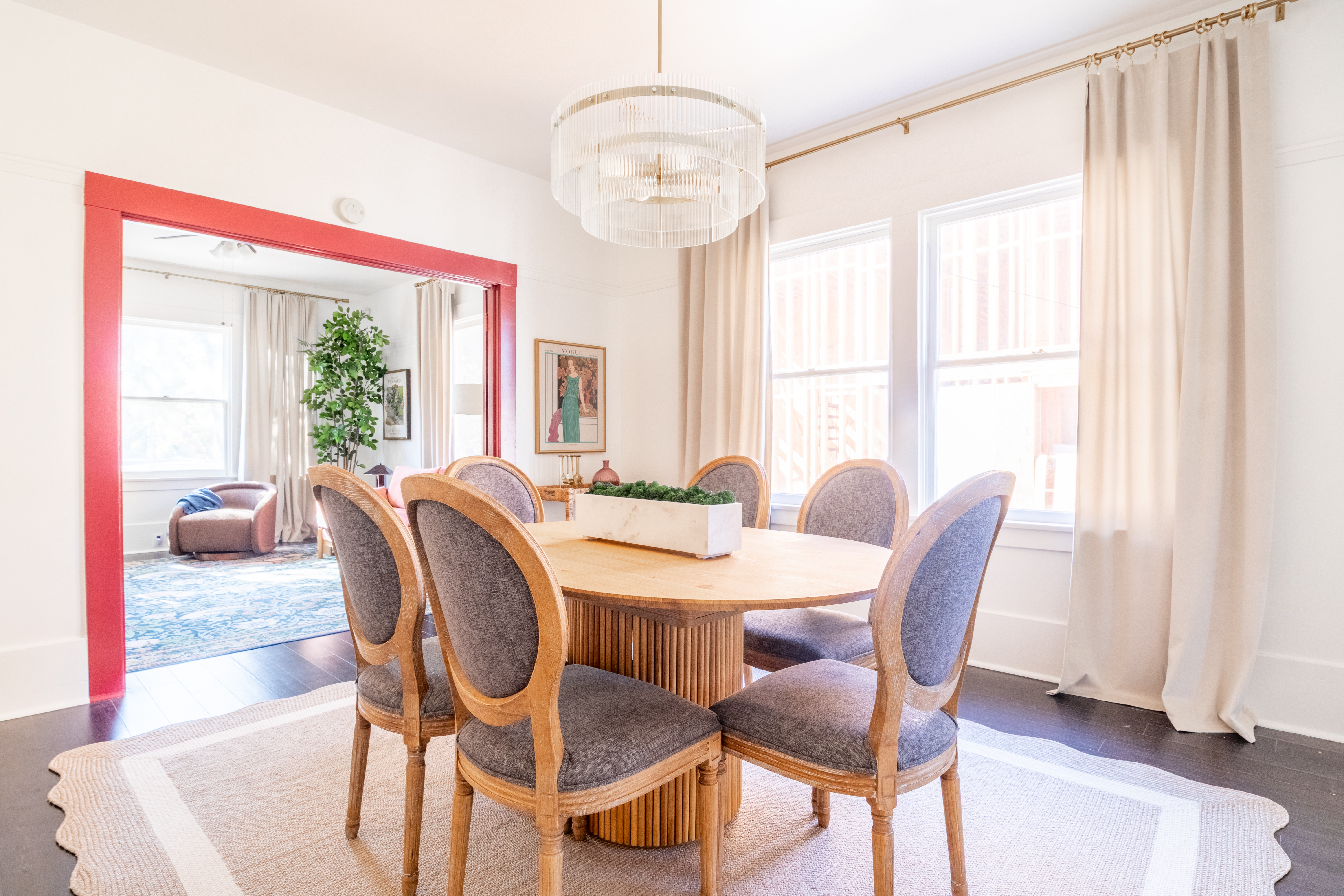 The Parlor House dining room with chandelier and French doors